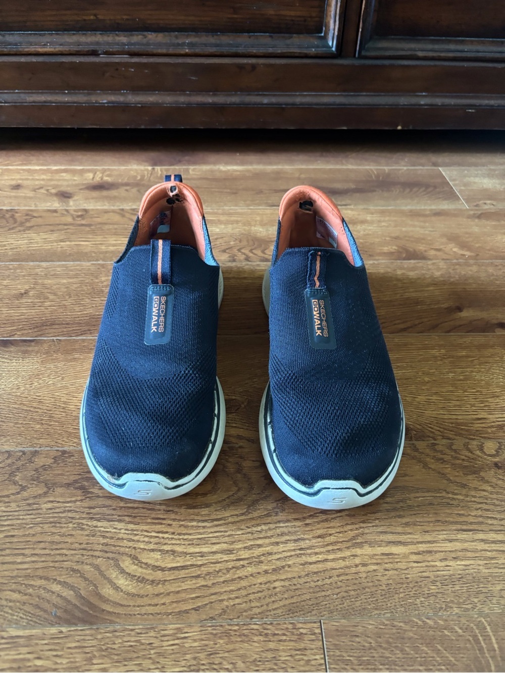 Skechers black slip-on trainers in size 9